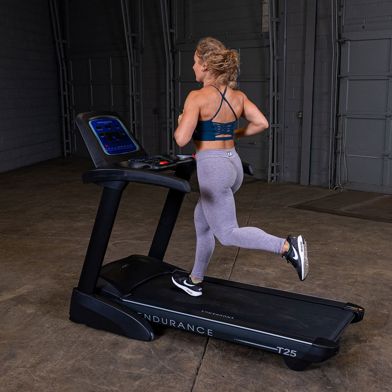 Body-Solid (T25) Foldable Incline Treadmill for Jogging & Walking, 400lbs. Weight Capacity, 4 HP Electric Motor Running Machine with Anti-Static Carbon Woven Belt, Speed Range 1-10 mph, Black
