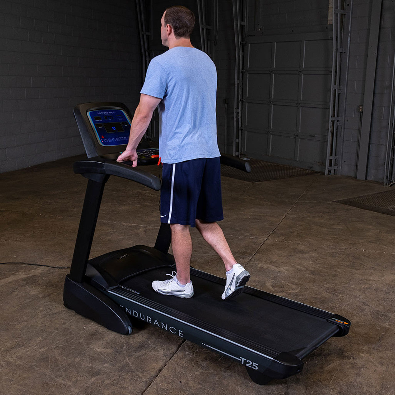 Body-Solid (T25) Foldable Incline Treadmill for Jogging & Walking, 400lbs. Weight Capacity, 4 HP Electric Motor Running Machine with Anti-Static Carbon Woven Belt, Speed Range 1-10 mph, Black