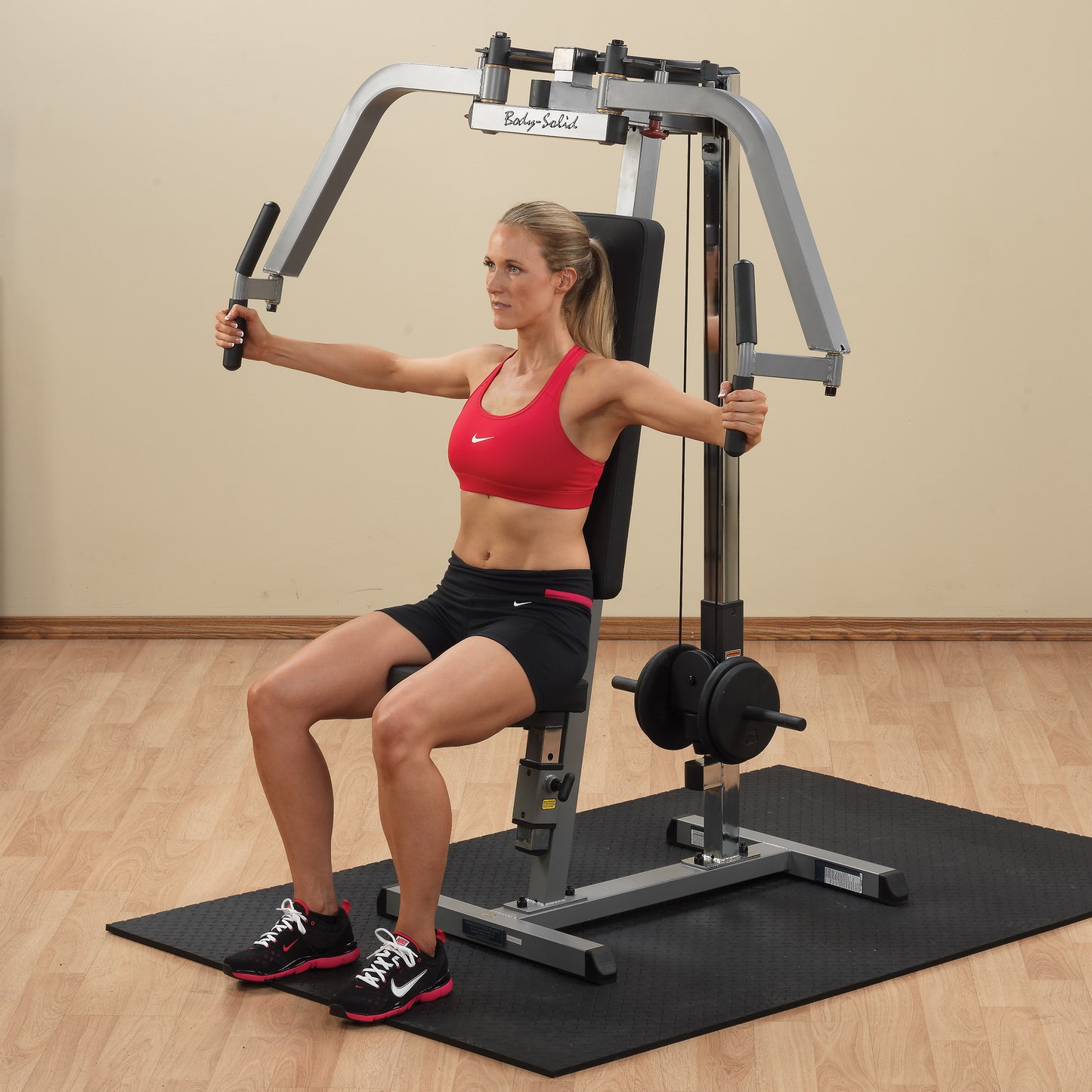 Body-Solid (GPM65B) Dual Function PEC Machine - Plate Loaded, Adjustable Chest, Back & Shoulder Workout Equipment